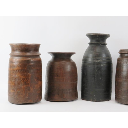 106 - A Group of five vintage/antique turned wood containers. (5 items) 35.2 cm height.
Condition report: ... 