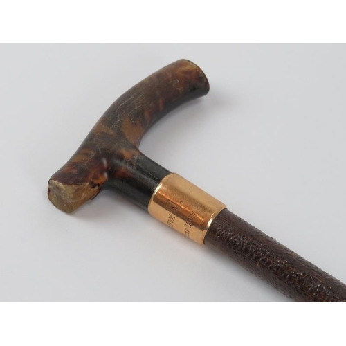 107 - A Victorian 15ct yellow gold mounted walking cane with tortoiseshell crutch handle. With a varnished... 