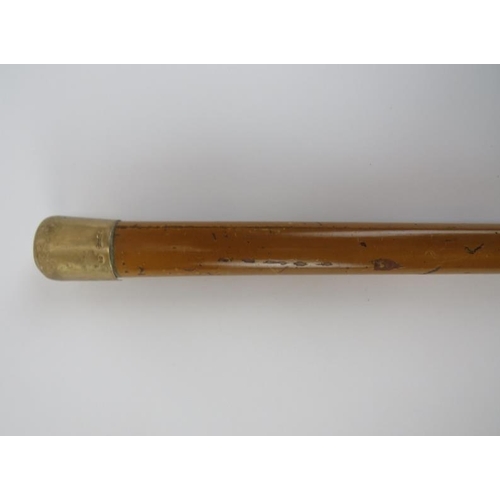 108 - A 9ct yellow gold mounted walking cane. With a lacquered wood shaft and horn ferrule, mark of M Jaco... 