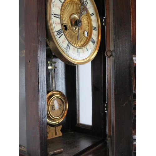 113 - A European wall clock, late 19th century. Probably German or Austrian. Key included. 64 cm height. 
... 