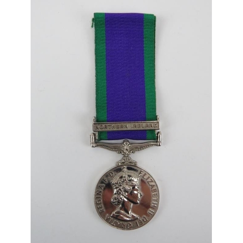 122 - A British ERII Campaign Service Medal with 'Northern Ireland' clasp.
Condition report: Some age rela... 