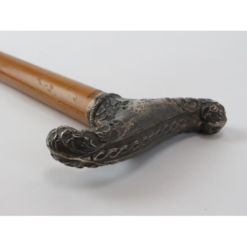 127 - A French silver crutch handled walking cane, late 19th/early 20th century. 91 cm length. 
Condition ... 