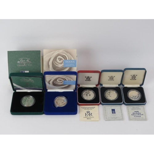 134 - Five Royal Mint silver five pound commemorative coins. Presentation cases and paperwork included. (5... 