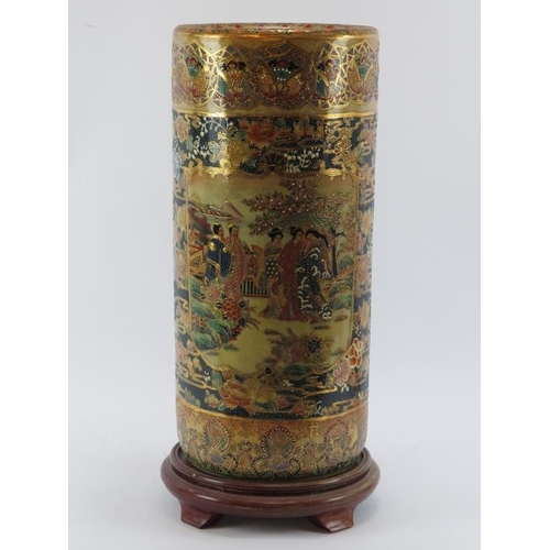 138 - A Japanese style Royal Satsuma porcelain stick stand. Of cylindrical form, profusely decorated with ... 