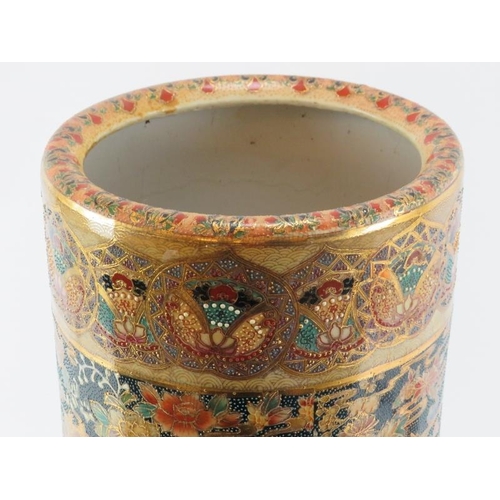 138 - A Japanese style Royal Satsuma porcelain stick stand. Of cylindrical form, profusely decorated with ... 