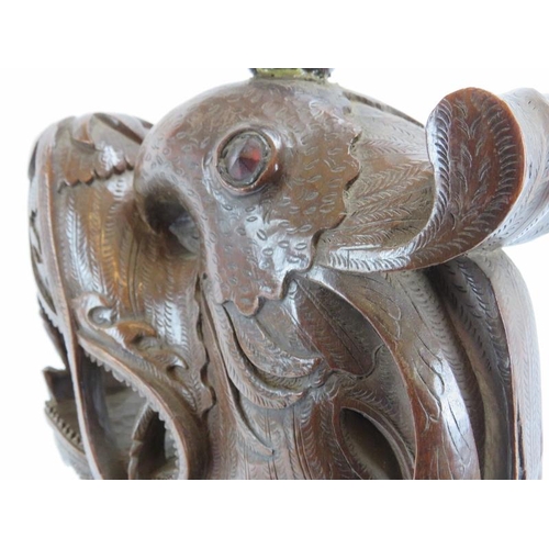 141 - A Burmese carved wood dragon lamp, early/mid 20th century. 60 cm height.
Condition report: Some age ... 