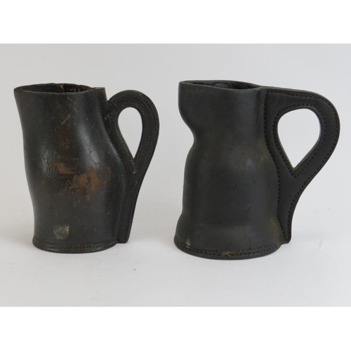 155 - Two antique leather blackjack jugs. One marked ‘Made by D.K. Murray Winchester’ beneath. (2 items) 2... 