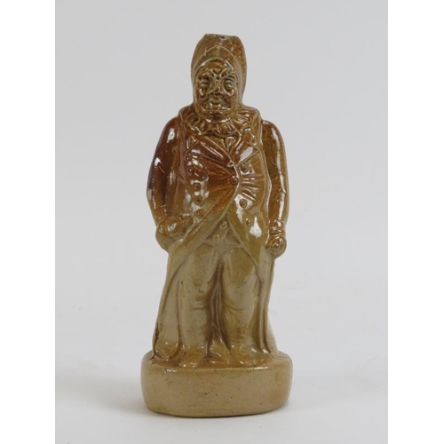 164 - A rare salt glazed stoneware flask modelled as an old portly male figure, 19th century. Depicted hol... 