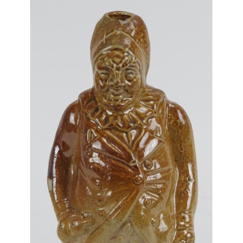 164 - A rare salt glazed stoneware flask modelled as an old portly male figure, 19th century. Depicted hol... 