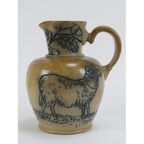 170 - A Victorian stoneware jug and a Bellarmine jug, dated 1977. The Victorian jug with incised decoratio... 