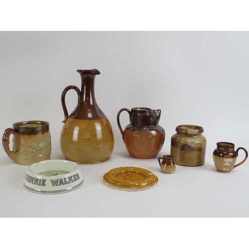 175 - A group of Victorian stoneware jugs and other ceramic items, 19th/20th century. Items included Doult... 