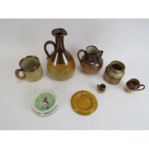 175 - A group of Victorian stoneware jugs and other ceramic items, 19th/20th century. Items included Doult... 