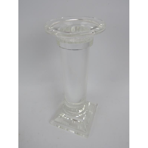 252 - A good quality lead crystal column candlestick (height 25cm) and two large red glass decorative baub... 