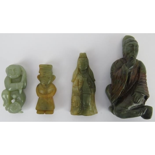 257 - A group of four Chinese celadon and russet jade figural carvings, 20th century. (4 items) Depicting ... 