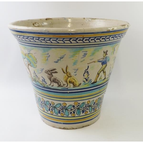 277 - A large decorative Spanish hand decorated Triana style pot with hare and hunter decoration. Height 3... 