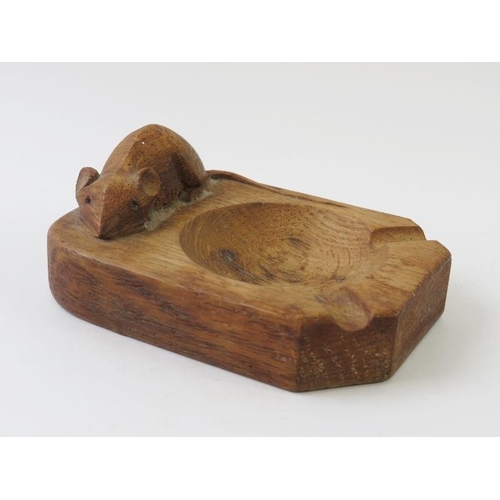 280 - A Robert 'Mouseman' Thompson carved oak ashtray, 10cm x 7.5cm.
Condition report: Some age related we... 