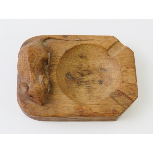 280 - A Robert 'Mouseman' Thompson carved oak ashtray, 10cm x 7.5cm.
Condition report: Some age related we... 