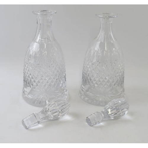 291 - A pair of finely cut bell shaped crystal glass decanters. Height 31cm. (Pair).
Condition report: Min... 