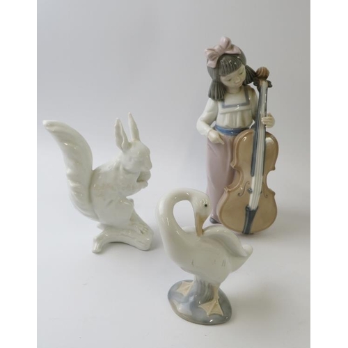 298 - Seven mixed Lladro, Nao and Kaiser porcelain figures including a squirrel, stork, geese, angel, cell... 