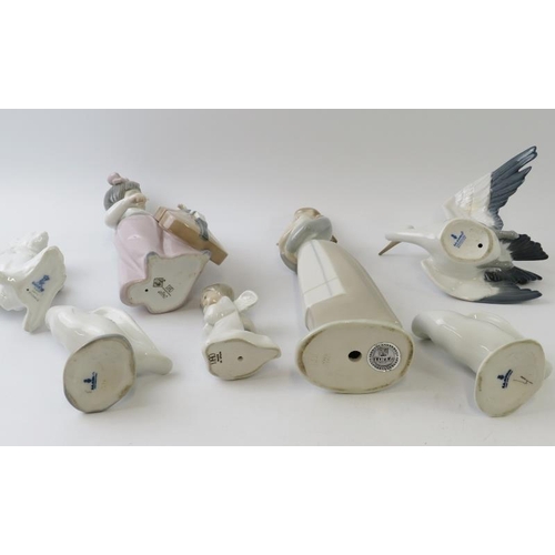 298 - Seven mixed Lladro, Nao and Kaiser porcelain figures including a squirrel, stork, geese, angel, cell... 