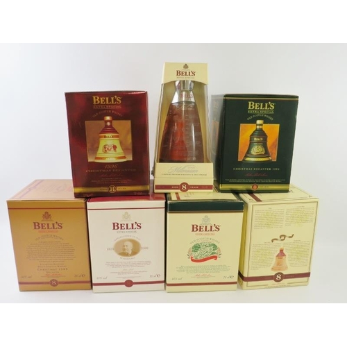 304 - Six commemorative Bell's Scotch Whisky ceramic decanters in original boxes to include Christmas 1994... 