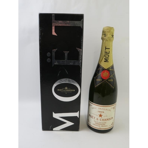 322 - A bottle of Moet et Chandon Dry Imperial 1975 vintage champagne in box. 75cl