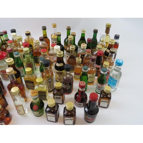 350 - A mixed lot of over 80 miniature whiskies, cognacs, spirits and liqueurs including many well known n... 