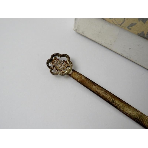 386 - A 20th century Chinese white metal tongue scraper style book mark with Chinese character decoration.... 