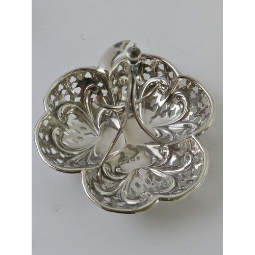 394 - An Edwardian pierced silver jewellery stand of trefoil form hallmarked for Birmingham 1907, maker Ge... 