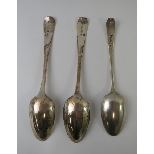 412 - A pair of George III Irish silver table spoons hallmarked for Dublin 1803, maker's mark rubbed, and ... 