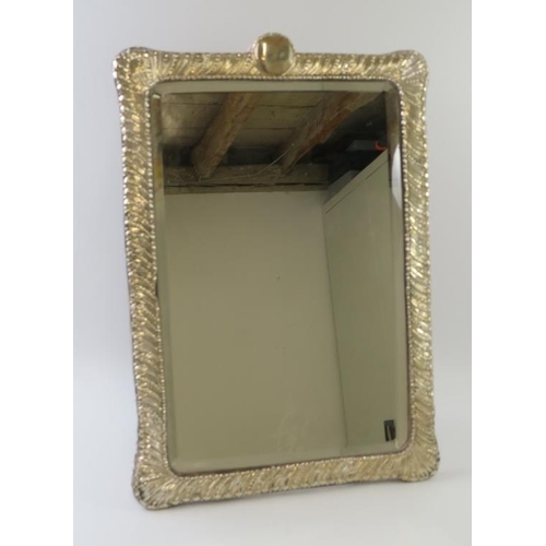 417 - A decorative Edwardian silver mounted dressing mirror with easel back and bevelled glass. Hallmarked... 