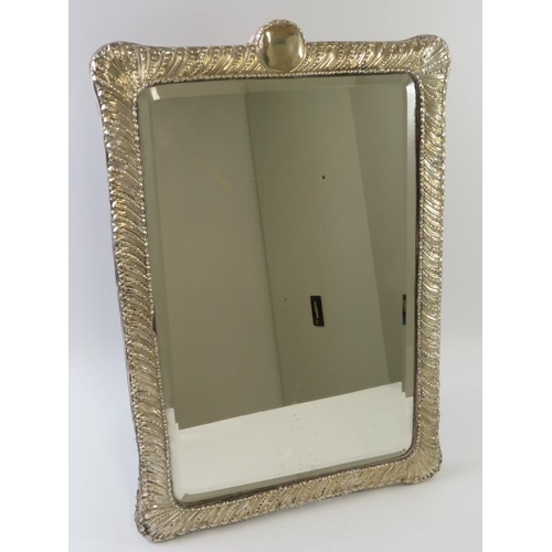 417 - A decorative Edwardian silver mounted dressing mirror with easel back and bevelled glass. Hallmarked... 