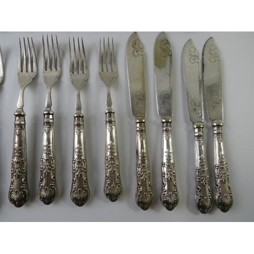 425 - A quantity of antique silver handled cutlery of various patterns and age.  Bearing English hallmarks... 