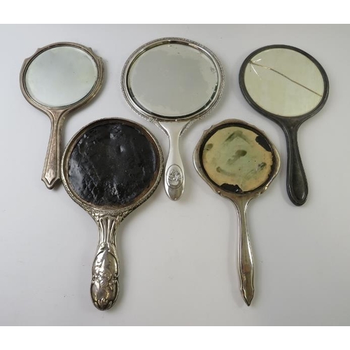 428 - Five antique silver backed dressing mirrors of various design  including Reynold's angels and irises... 