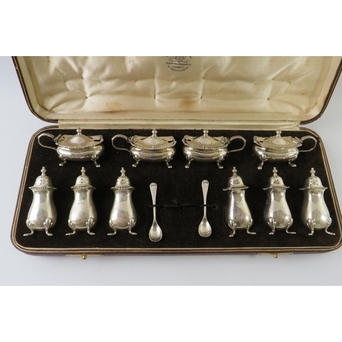 430 - A 1930s 10 piece cased silver cruet set by Goldsmiths & Silversmiths Co comprising four mustards wit... 