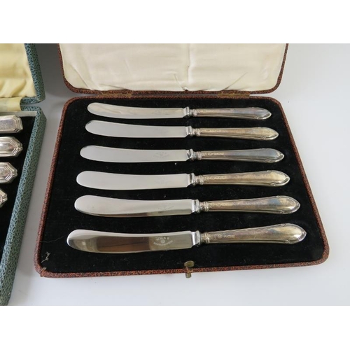 432 - Two boxed sets of six hallmarked silver handled butter knives. NOTE: One knife is a replacement.(2)