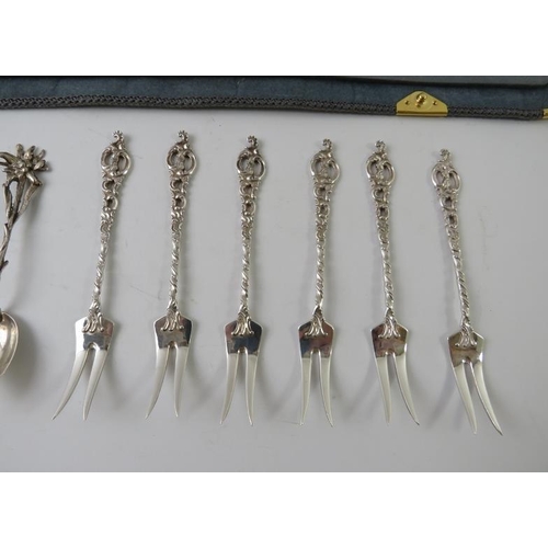 433 - A set of six ornate Norwegian Sterling oyster forks, six 800 Argento teaspoons, a pair of agate moun... 