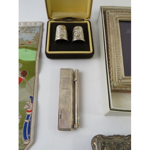 437 - A mixed lot of hallmarked silver collectables to include a silver mounted book mark, pair of Charles... 