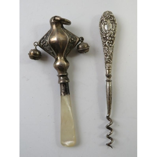 438 - A mixed lot of silver and other collectables to include pencils, manicure tools, baby's rattle, aide... 