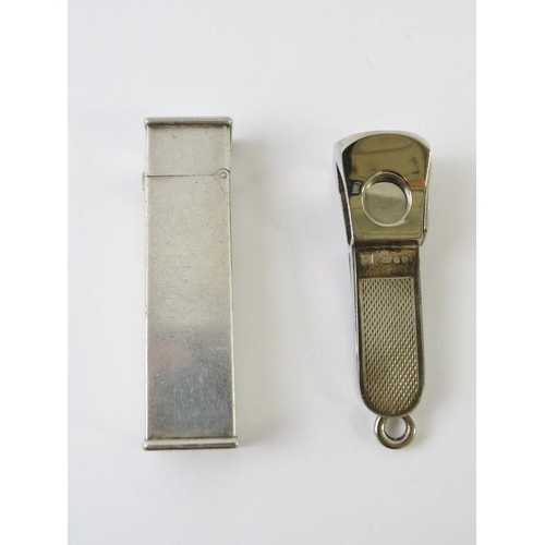 440 - A 1930s Dunhill for Cartier tallboy cigarette lighter, silver plated, and a hallmarked silver cigar ... 