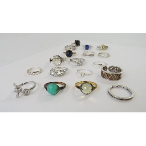 456 - A collection of white metal rings most stamped 925 to include some set with paste stones, 38gms appr... 