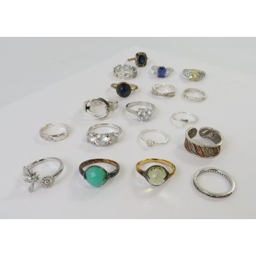 456 - A collection of white metal rings most stamped 925 to include some set with paste stones, 38gms appr... 