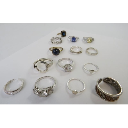 456 - A collection of white metal rings most stamped 925 to include some set with paste stones, 38gms appr... 