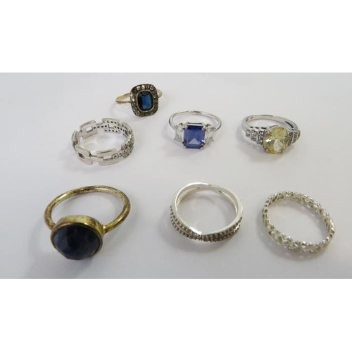 456 - A collection of white metal rings most stamped 925 to include some set with paste stones, 38gms appr... 