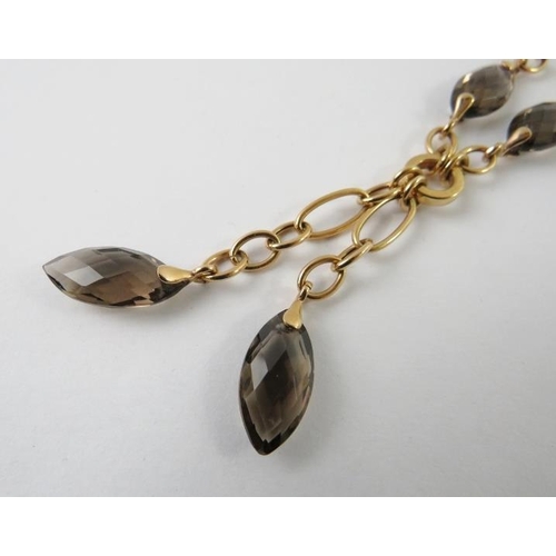 457 - An Italian precious yellow metal and smokey quartz ‘neglige’ pendant necklace stamped 750, 440mm len... 