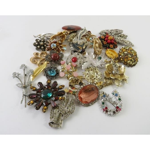 466 - A collection of decorative paste brooches, 640gms gross approx