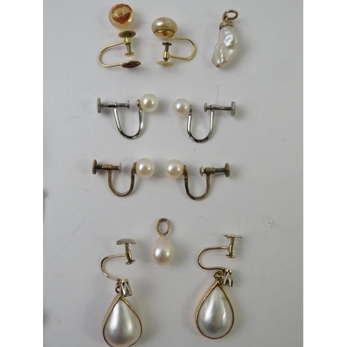 489 - A pair of 18ct yellow mabe pearl and diamond drop earrings with screw fittings, 23.5mm drop overal; ... 