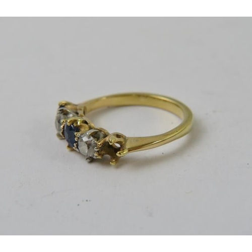 491 - A precious yellow metal sapphire and diamond half-hoop ring, with two round old cut diamonds and two... 