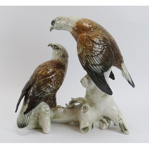 5 - A Karl Ens porcelain group depicting two eagles perching on a tree stump. Printed factory marks and ... 