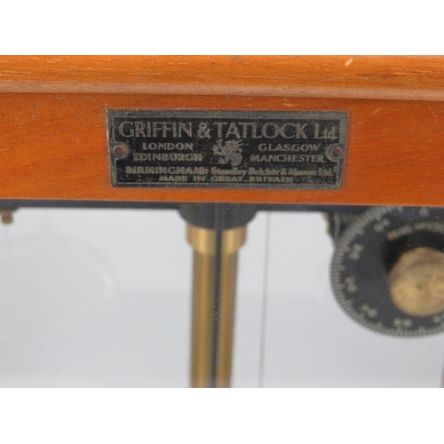 56 - A Griffin Tatlock Ltd pair of vintage laboratory balance scales and a boxed set of brass scales. The... 